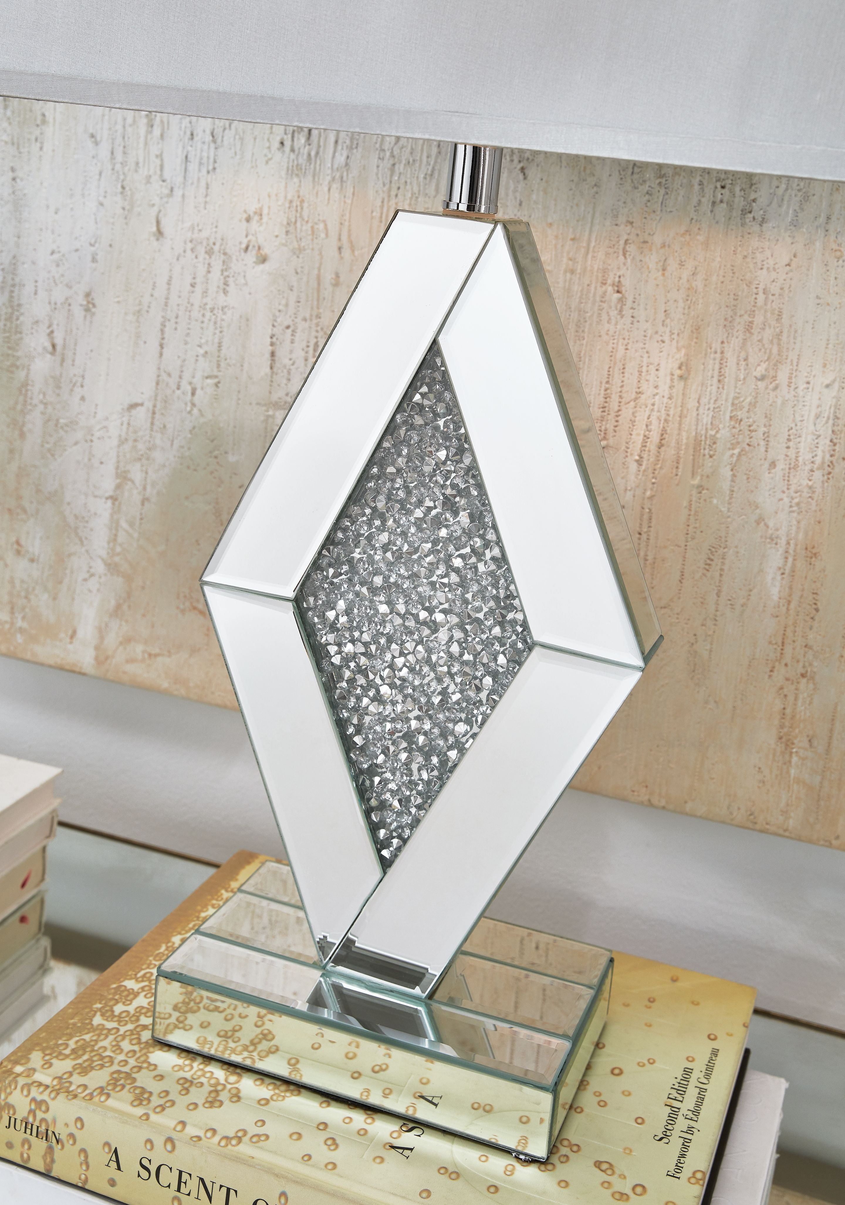 Silver mirror table lamp with white shade and glittering diamond centerpiece