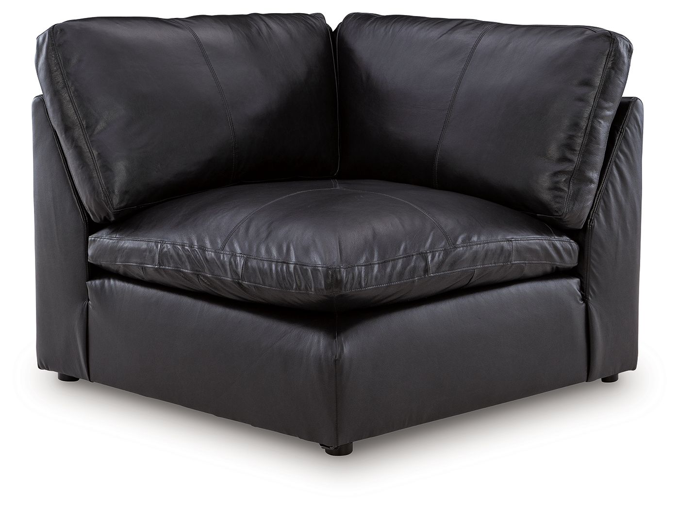 Black wedge sofa chair with padded arms, cushioned seat, and square legs
