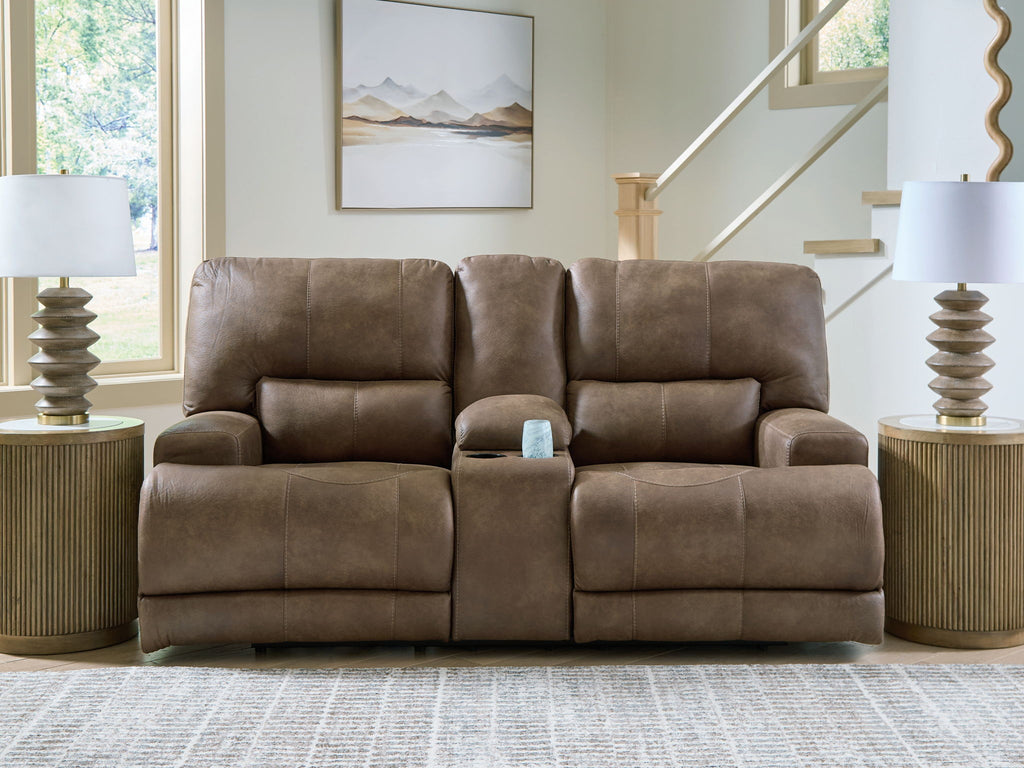 Earth-tone power reclining loveseat with adjustable headrests and center console, two-seat design