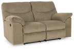 Reclining loveseat in beige fabric with padded armrests and two back cushions