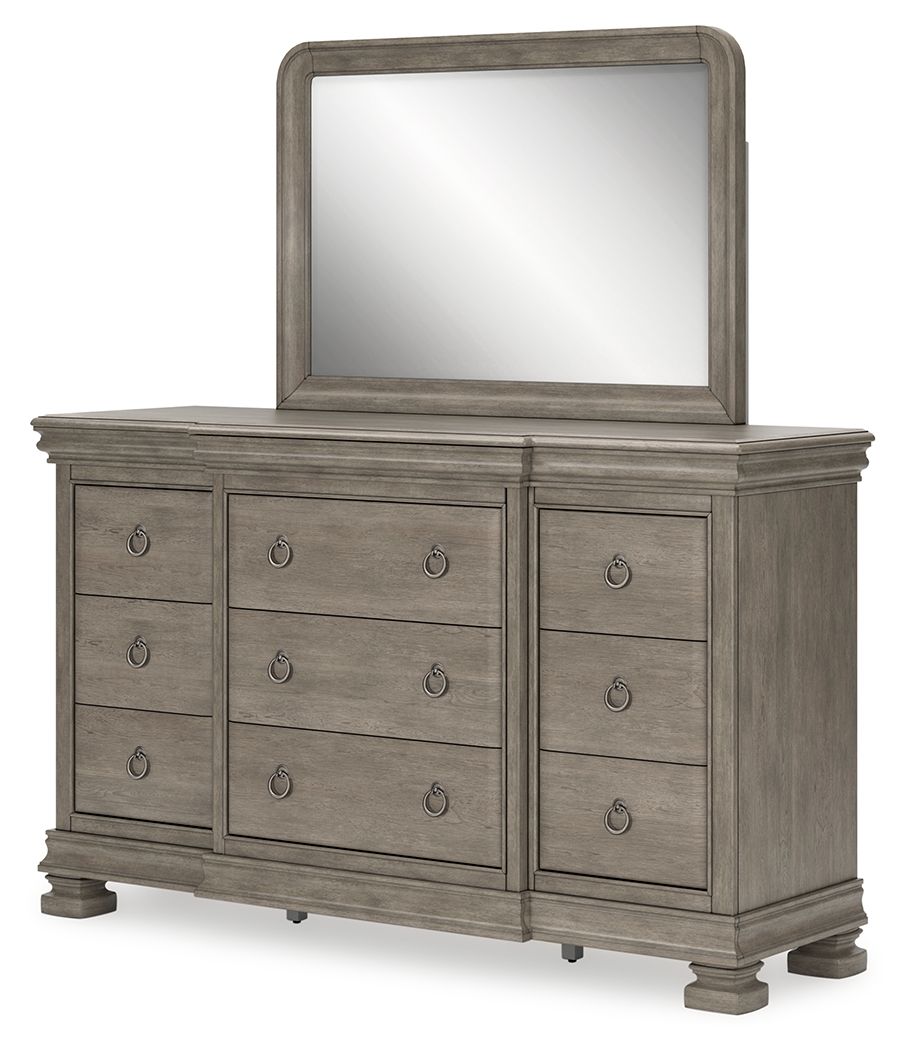 Gray dresser with tall rectangular mirror and multiple drawers with oval knobs