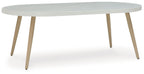 Dining table with light gray round top and light wood legs