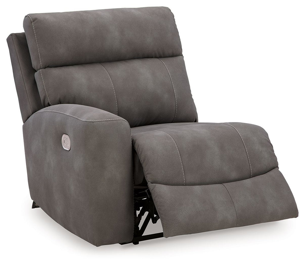 Slate gray power recliner chair with extended footrest, padded arms, and back panel