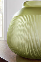Green glass vase with short neck and vertical ridged texture; curved bulb body.