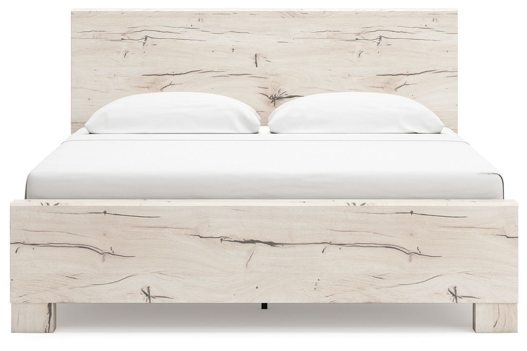 Beige panel bed frame with white upholstered panels and arched headboard