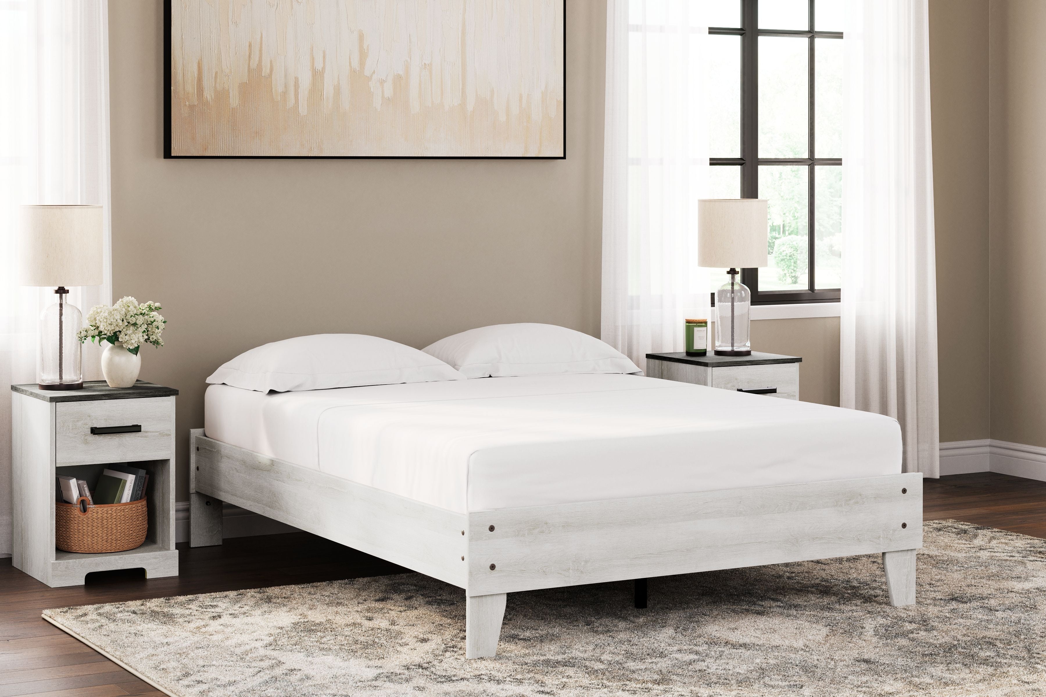 White platform bed with slatted base, paired posts, and fitted white mattress