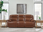 Chocolate brown power reclining sofa with three padded headrests and plush seat cushions