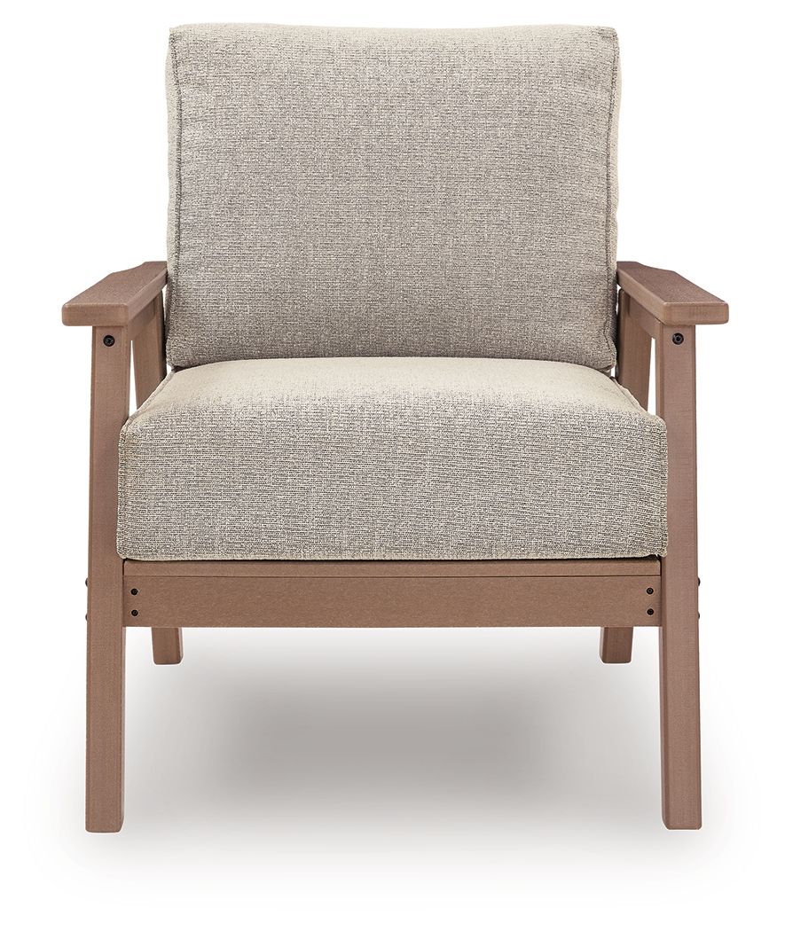Front view lounge chair with light beige cushioned seat and back on driftwood frame
