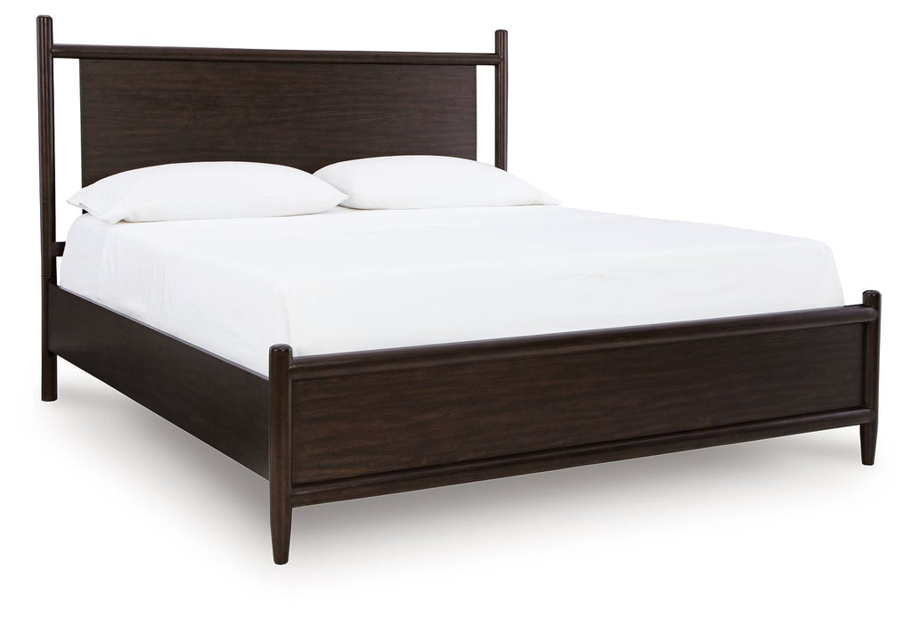 Dantenton panel bed in dark brown with arched headboard and white bedding