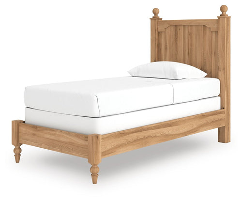 Light brown wooden panel bed with white upholstered mattress and curved headboard