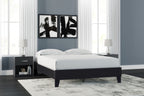 Queen platform bed in black with white mattress and low-profile platform base
