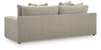 Light gray fabric sofa with three seat cushions and four back pillows, square arms