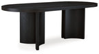 Black oval dining room table with thick tabletop and four pedestal-style legs
