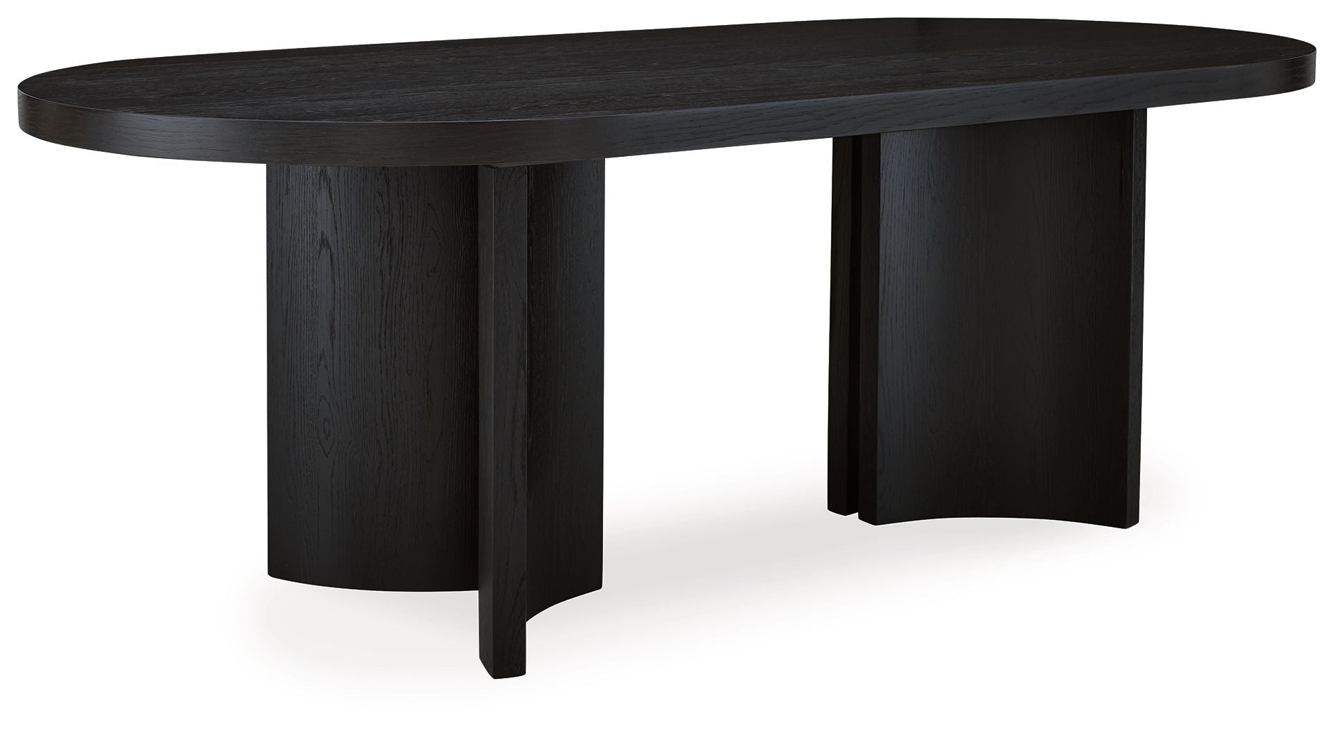 Black oval dining room table with thick tabletop and four pedestal-style legs