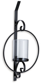 Black wall sconce with clear glass cylinder shade and curved metal frame