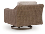 Beige cushion swivel lounge chair in woven brown wicker with round rotating base