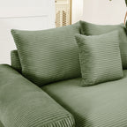 Green corduroy sectional sofa with back cushions and rolled arm