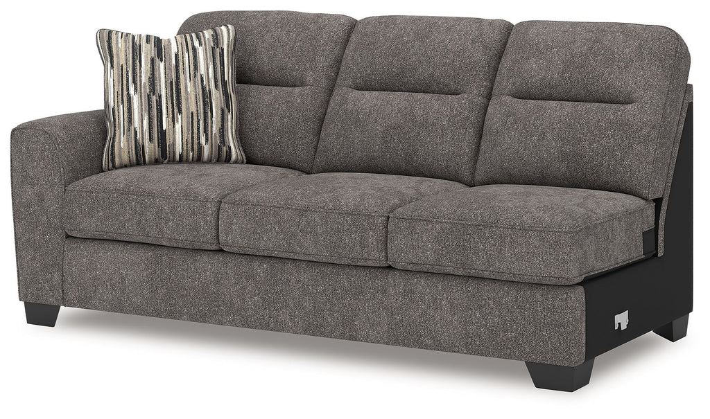 Graphite gray fabric sofa with chaise and striped accent pillow