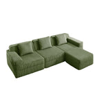 Green corduroy modular sectional sofa with chaise and seat-back pillows