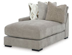 Pebble gray corner chaise with cushioned seat and two decorative pillows