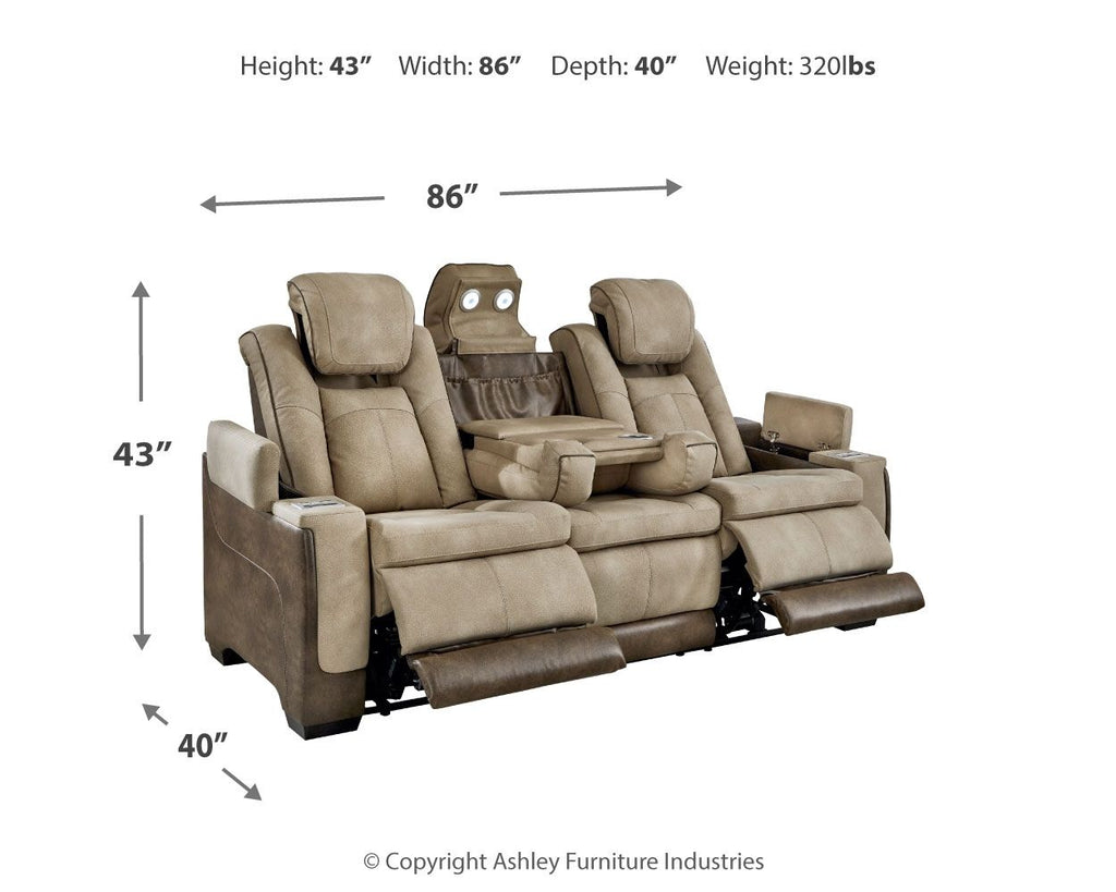 Sand power reclining sofa at an angle with extended footrests and reclined seats.