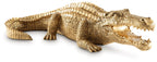 Antique gold crocodile sculpture with textured scales and open mouth