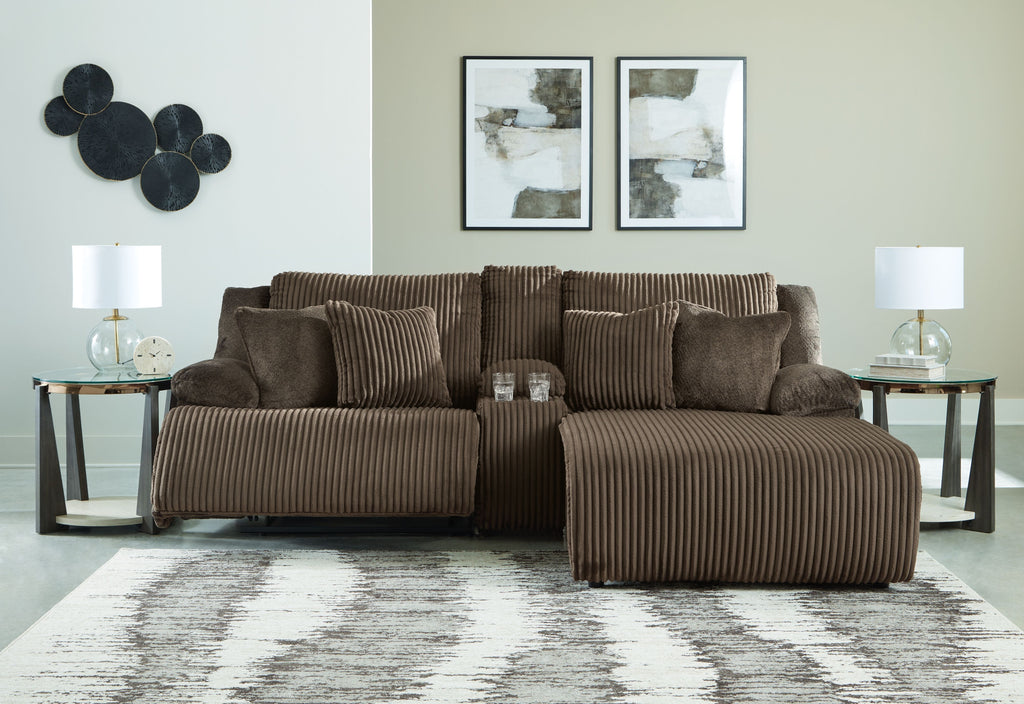 Dark brown corduroy-style reclining sectional sofa with right chaise and pillow back