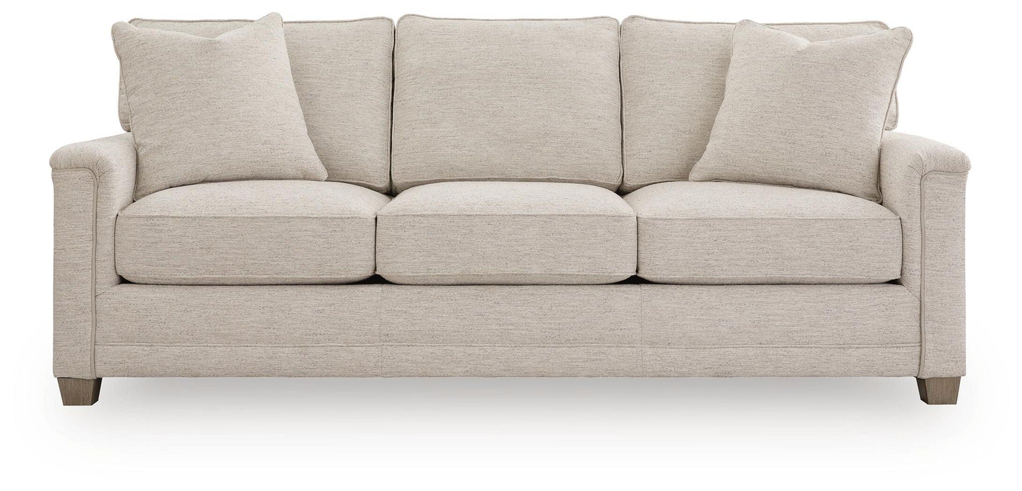 Light beige fabric sofa with four back cushions, three seat cushions, short legs