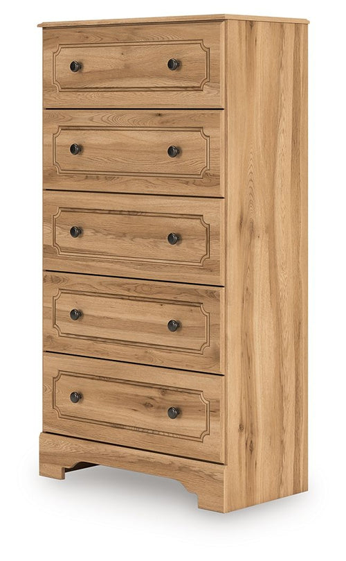 Warm brown five-drawer chest with carved drawer fronts and dark knob pulls