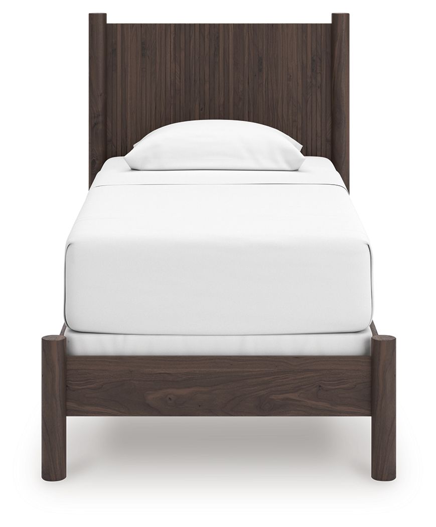 Dark brown panel bed with white upholstered mattress and curved headboard
