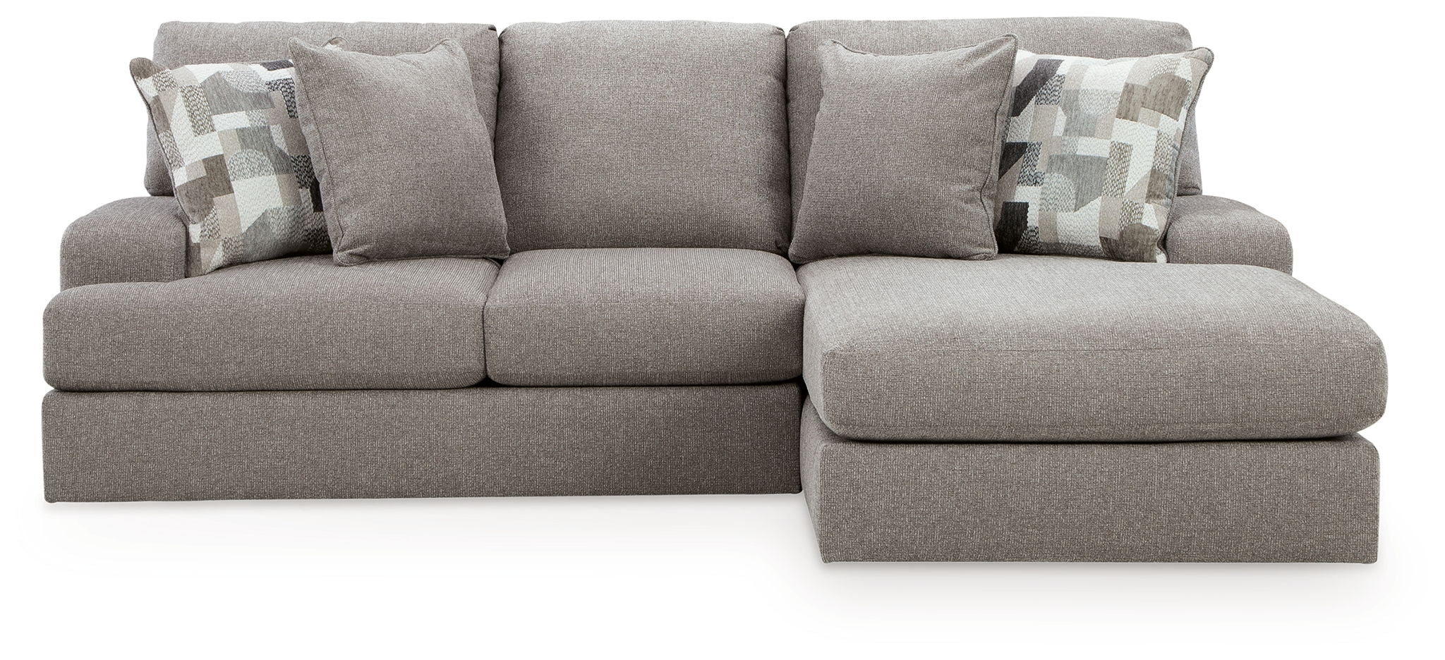 Lindon sectional sofa in smoke gray with corner chaise and patterned throw pillows