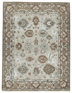 Memory foam rug with ornate border and light cream field, dark brown pattern