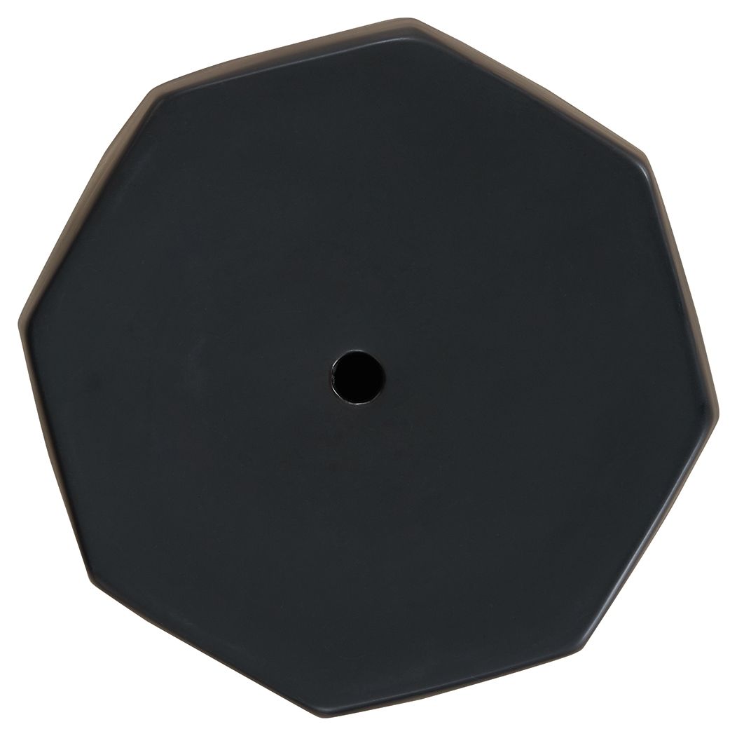 Black geometric stool top view with central circular hole.