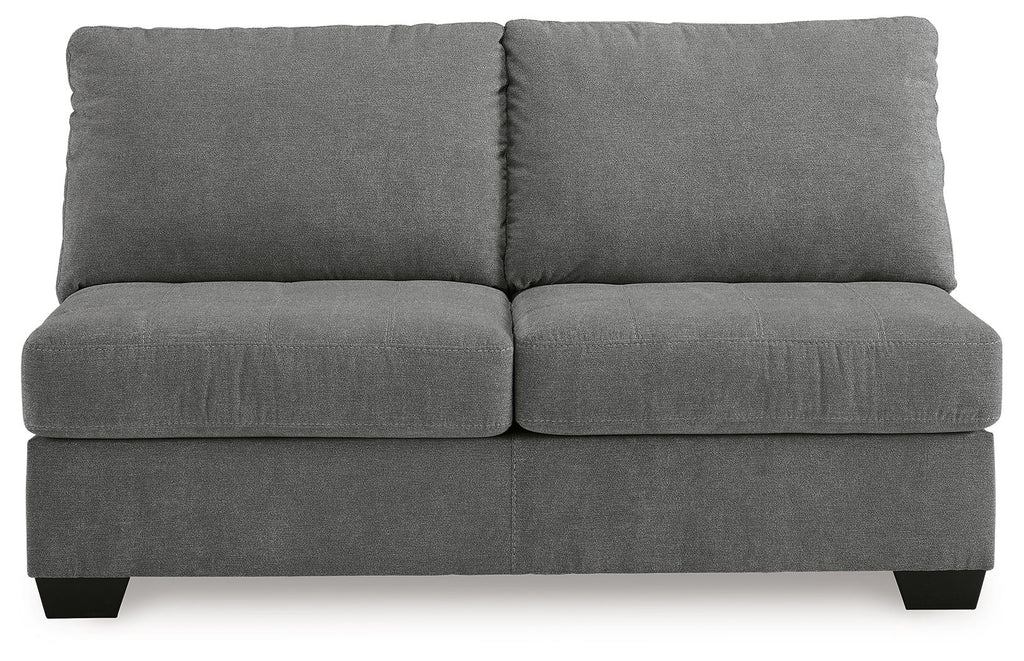 Gray armless loveseat with two back pillows and a boxy two-seat base
