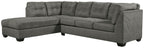 Slate gray sectional sofa with chaise and tufted back cushions, square arms.