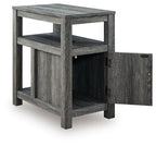 Chair side end table in dark gray wood finish, open shelves and hinged cabinet door.