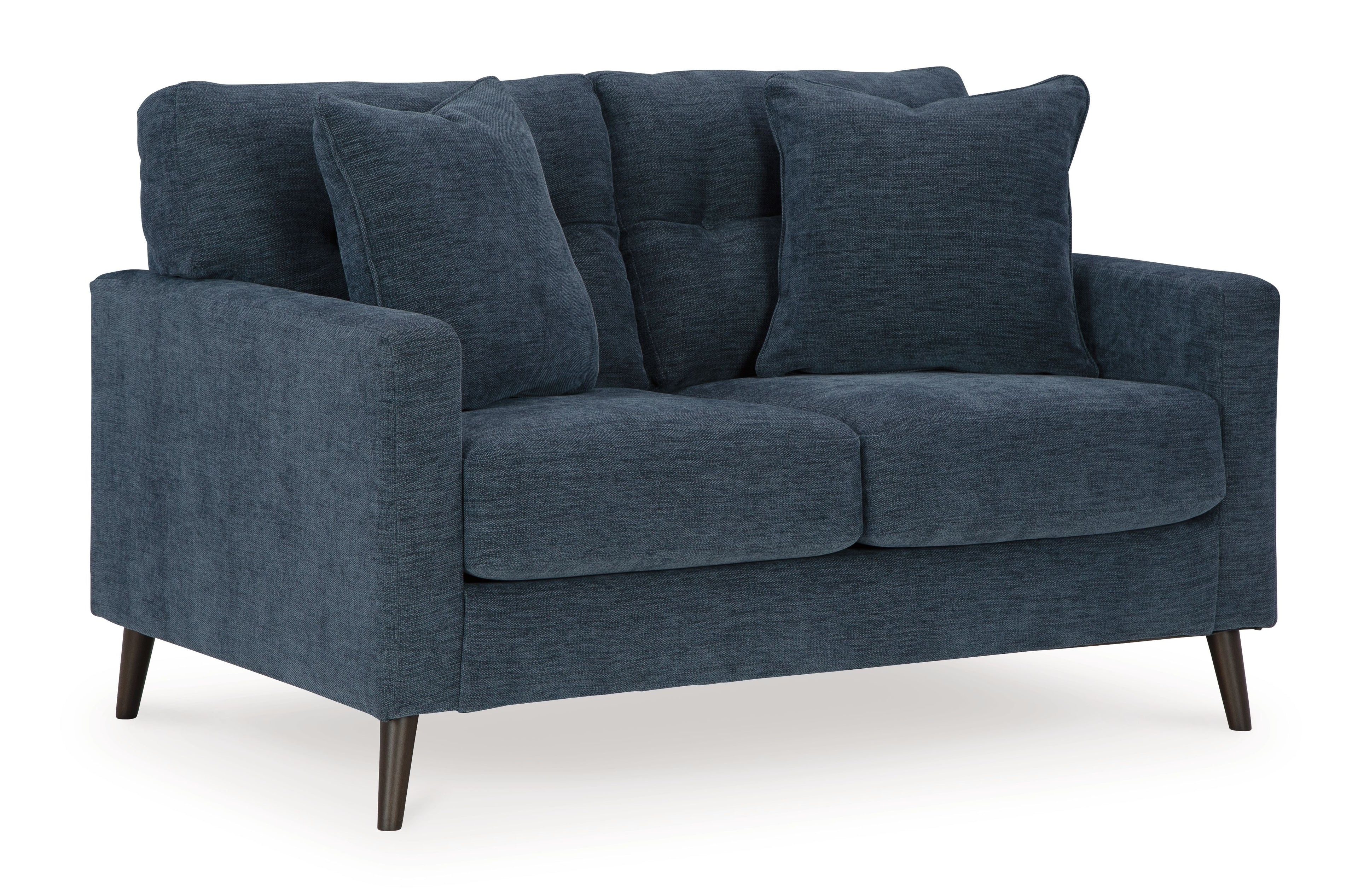 Blue loveseat with tufted back, rolled arms, and two cushioned seat sections.