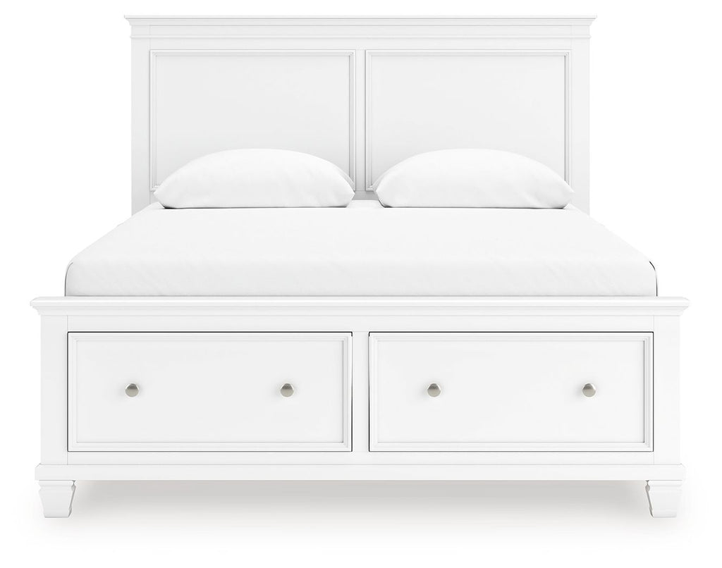 White panel bed with two front drawers and two upholstered pillows against the headboard
