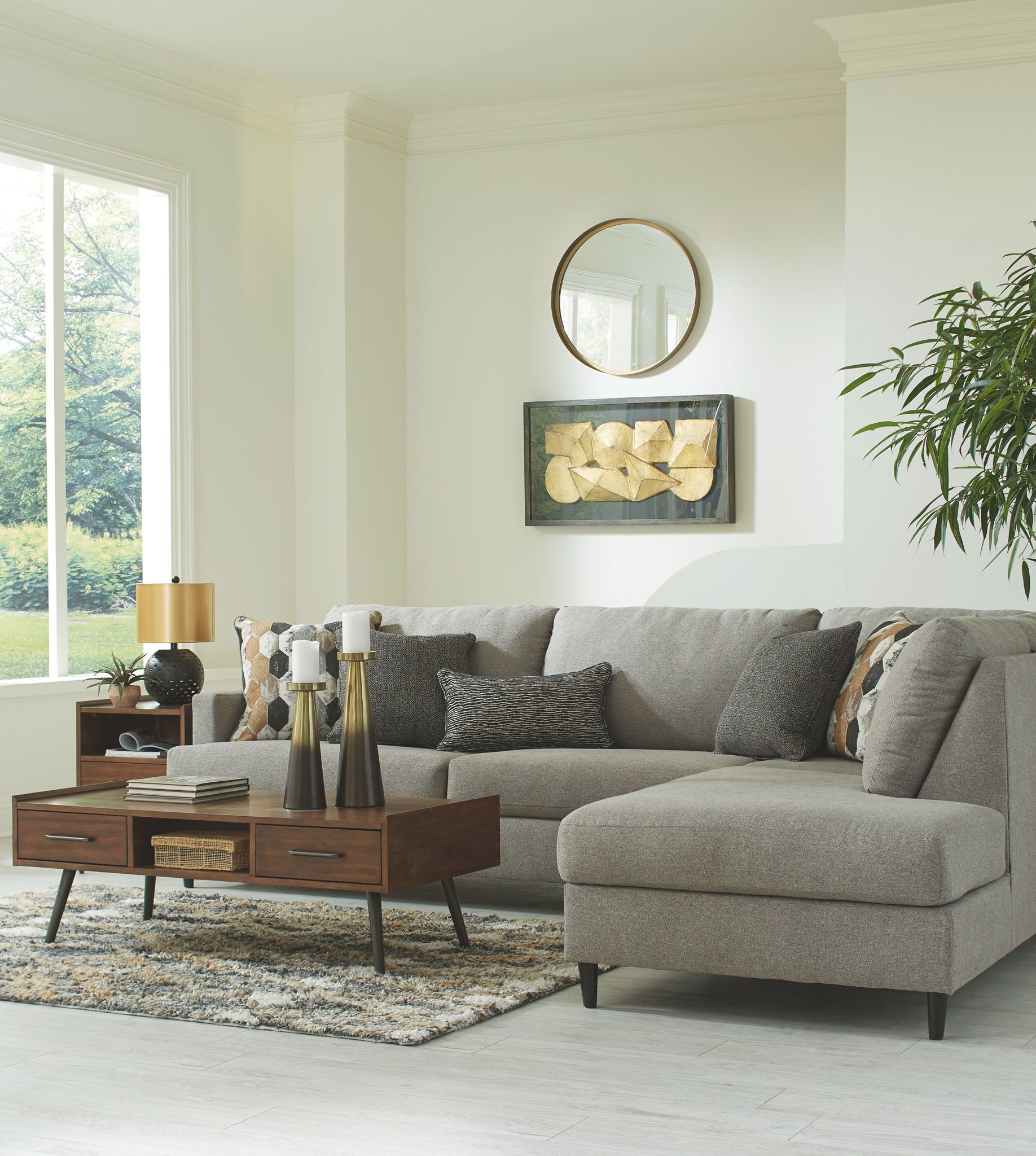 Granite gray fabric sectional sofa with chaise corner, square arms, and stacked back pillows