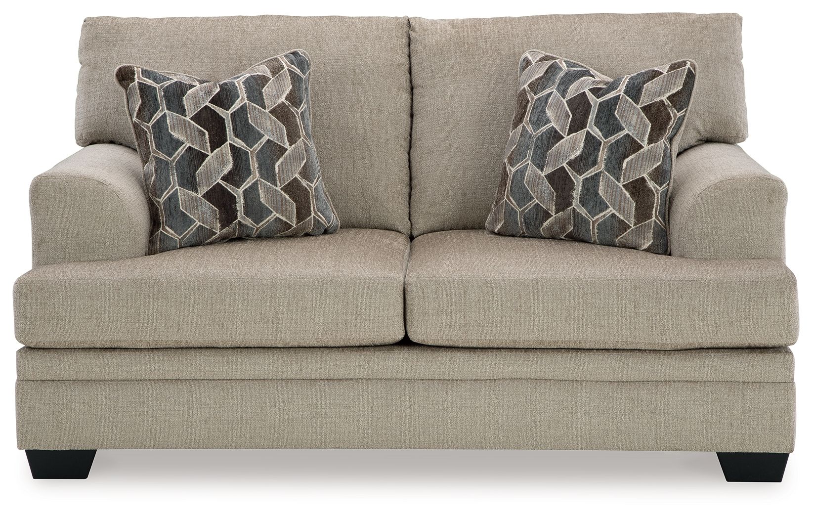 Light beige fabric loveseat with two geometric patterned pillows, head-on view