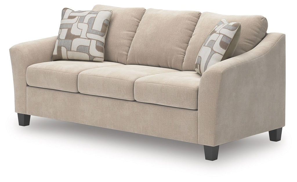 Taupe queen sofa sleeper with tufted back, two accent pillows, and block arms