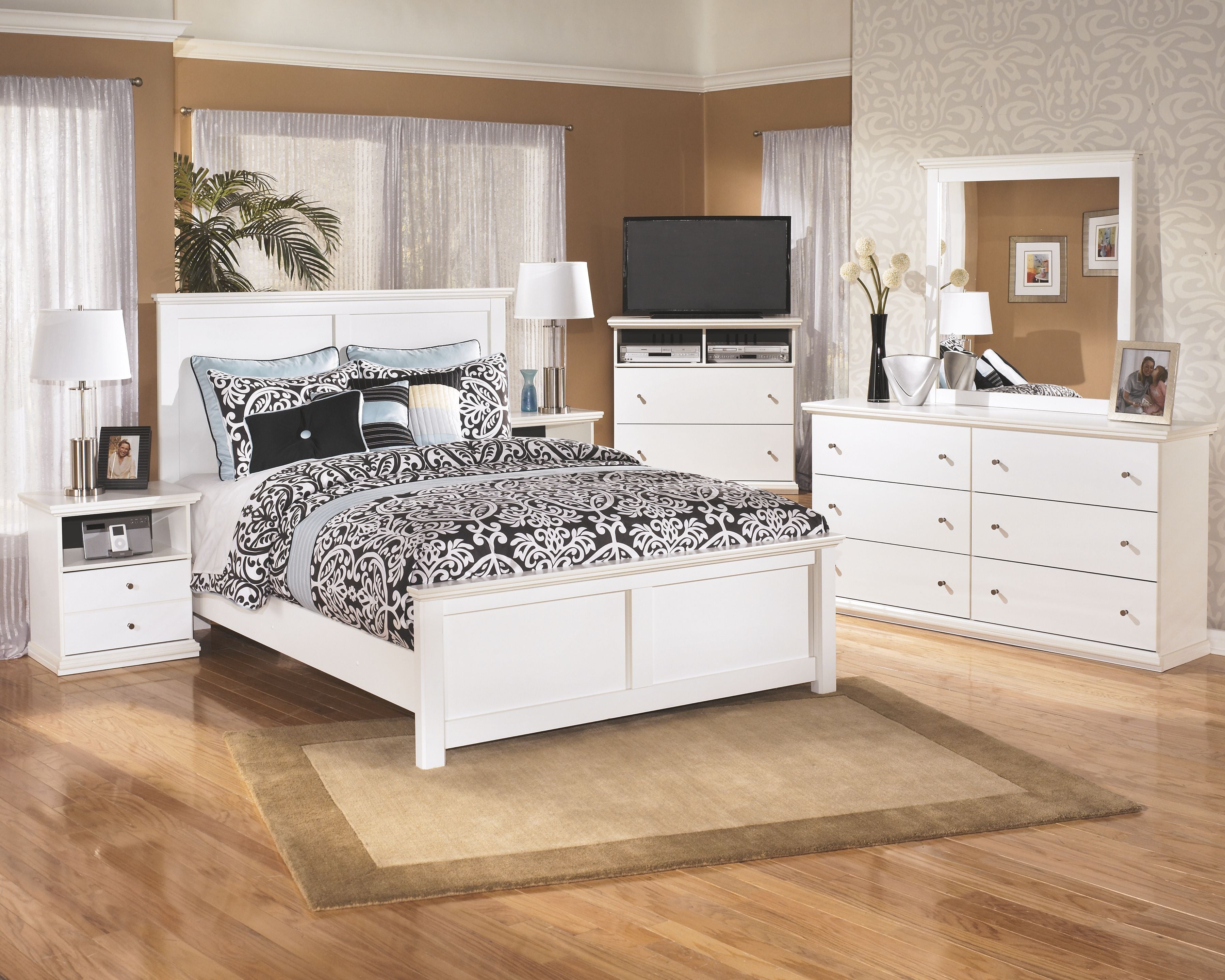 White six-drawer dresser with brass knobs and flat top