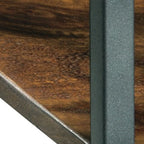 Accent table corner with dark metal frame and wood tabletop edge.