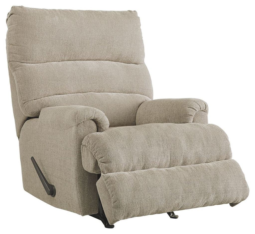 Upholstered rocking recliner chair with curved arms and thick cushioned footrest