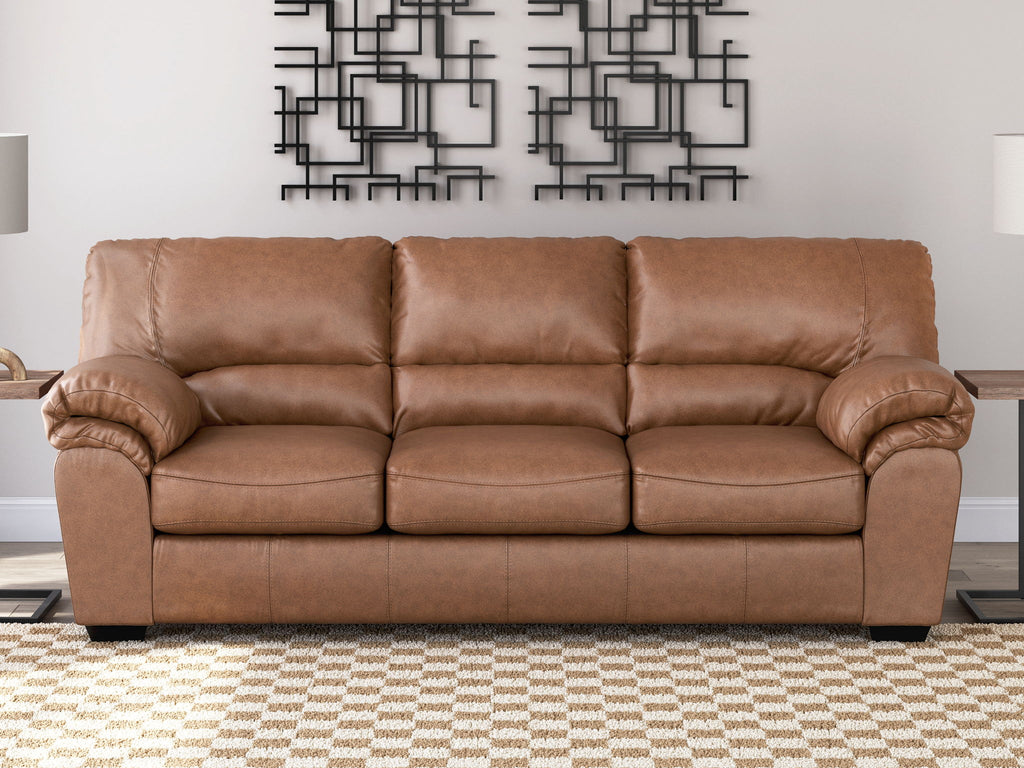 Light brown 3-seat sofa with tufted back, deep seat cushions, rounded arms