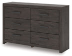 Charcoal six-drawer dresser with two-column drawer layout and bar pulls, side view.