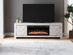 Light wood fireplace TV stand with open media shelf and burning fireplace insert