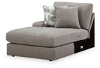 Smoke gray corner chaise with thick seat cushion, tall back, and two pillows