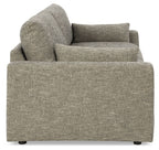 Gray fabric sofa with rounded arms, deep seat cushion, and back pillows.