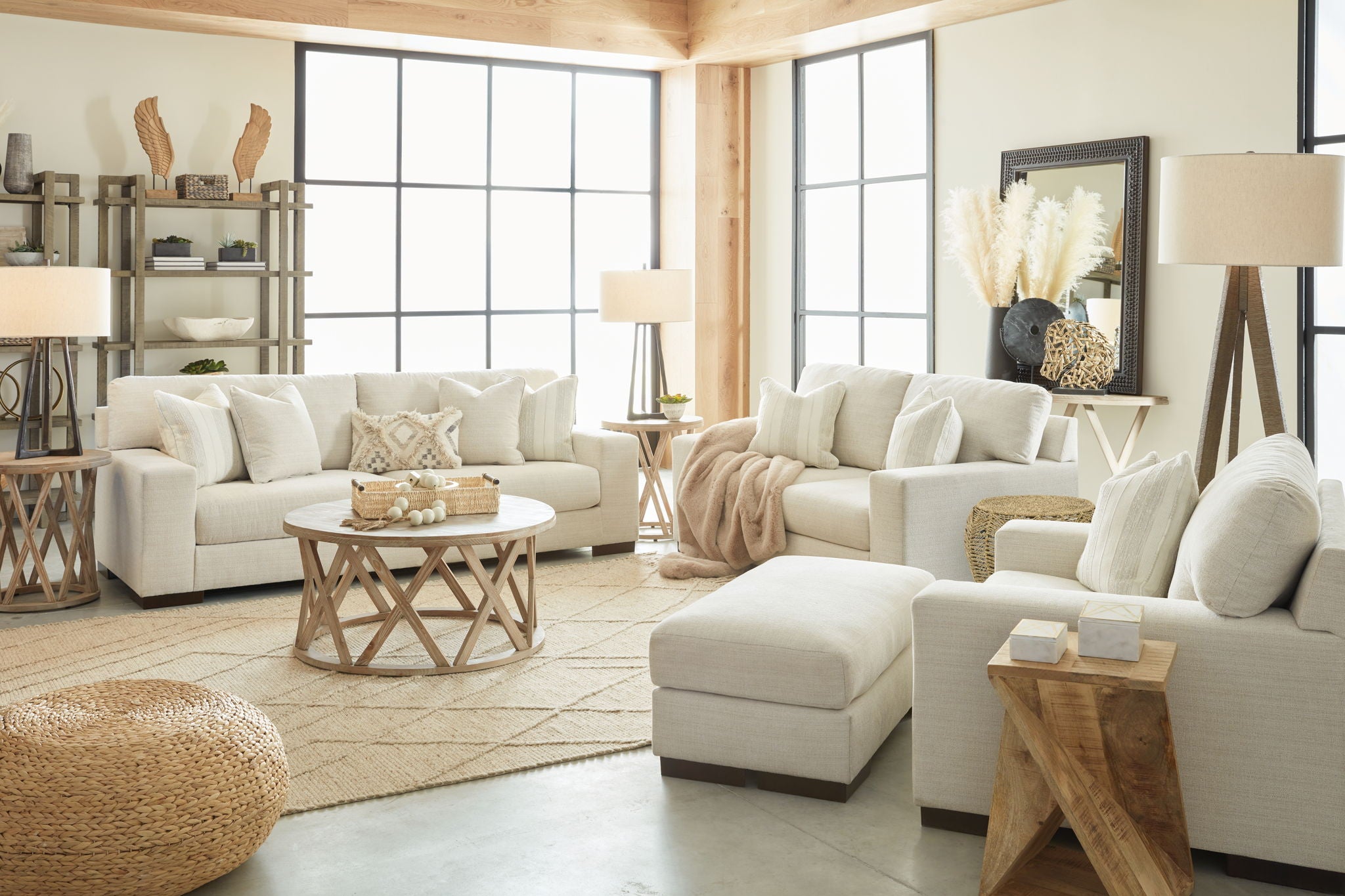 Light beige living room set with sofa, chair, and ottoman
